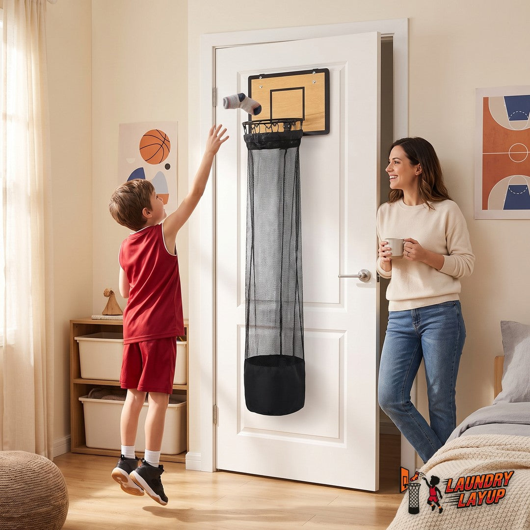 Mom smiling while her son tosses a sock into the Layup Hoop